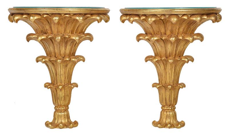 Fine Pair Art Deco Giltwood Lighted Consoles: probably French, circa 1920s, each with demilune top with original glass insert and lighted interior, set on a tapered lotus leaf carved pedestal, 39 x 25 x 15-1/4 in.- Note: This lot includes the ori