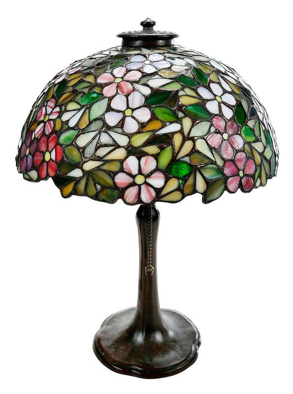Handel Stained Glass Dogwood Table Lamp: American, early 20th century, patinated bronze floriform lamp, rim of base marked "Handel", with leaded slag glass shade with pink and white blossoms, interior marked "Handel", 10-1/4 in. diameter; ov