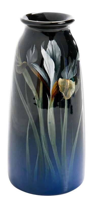 Carl Schmidt Rookwood Blue Vase With Irises: American, circa 1909, iris glazed vase decorated with iris flowers on blue shaded ground, impressed Rookwood flame mark over "1658E/W" with "SC" within circle, 8 in. - Provenance: From The Collection 