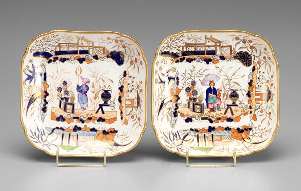 Pair English ironstone shallow bowls:: Asian scenes in the Imari palette, iron red, cobalt blue, gilt highlights, one with court official with attendant, other with figure holding a staff, possibly Davenport, early 19th century, each 8-7/8