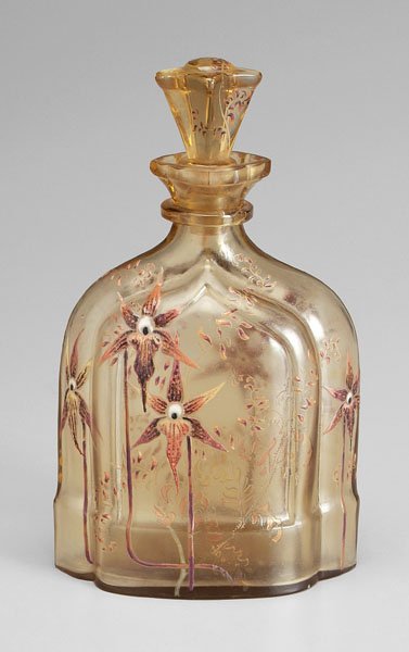 Galle floral decanter,: enameled flowers on pale amber ground with purple highlights, base marked "Emile Galle Depose", 8-3/4 in. Excellent condition, minor base wear, stopper with minor abrasions. Provenance: The Estate of 