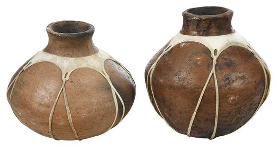 Two Pieces Catawba Indian Pottery: York County, South Carolina, 20th century, fired earthenware with varying black, brown and tan coloring, likely fluid vessels, stretched sinews around shoulders, laced to a stretched pieces on the bas