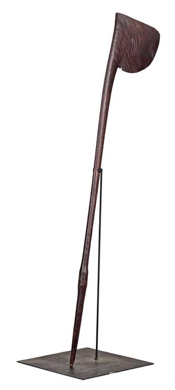 Maori Tribal Carved Wooden Club or Staff: New Zealand, probably 19th century, with flat semi circular head, 42-1/2 in.; with metal stand - Provenance: Private Collection, Tryon, North Carolina
