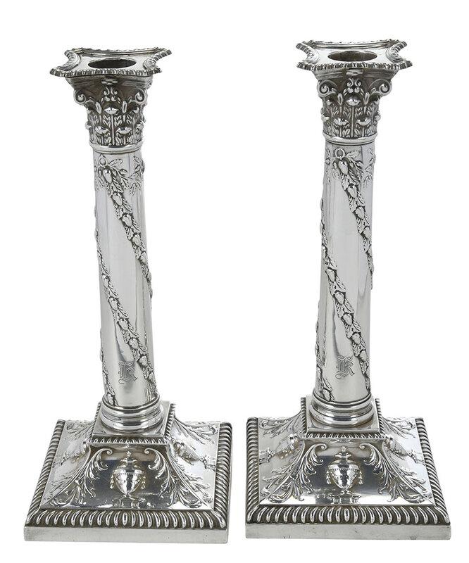 Pair of English Silver Candlesticks: London, 1917, Corinthian column with diagonal floral decoration, gadroon and urn bases, marks for Thomas Bradbury & Sons Ltd and retailer on base Tiffany & Co., all pieces with matching marks, .925 f
