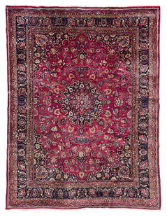 Sarouk Carpet: mid 20th century, blue medallion on red field with floral sprays, blue spandrels, 12 ft. 5 in. x 9 ft. 8 in.