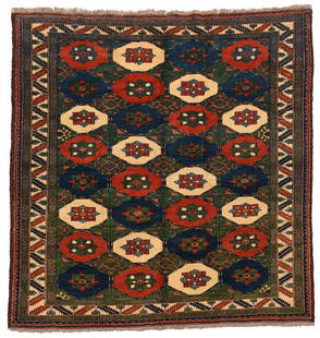 Kazak Rug: 20th century, field of repeating blue, red and ivory medallions, leaf and wine glass border, 6 ft. 6 in. x 6 ft. 2 in. - Provenance: Private Collection, Tryon, North Carolina