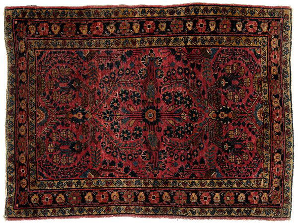 Sarouk rug,: central medallion with floral bouquets on bright red ground, heavy construction, painted rug from 1920s, 3 ft. 5 in. x 4 ft. 9 in. Generally even low pile, areas of wear with corduroy effect, end and