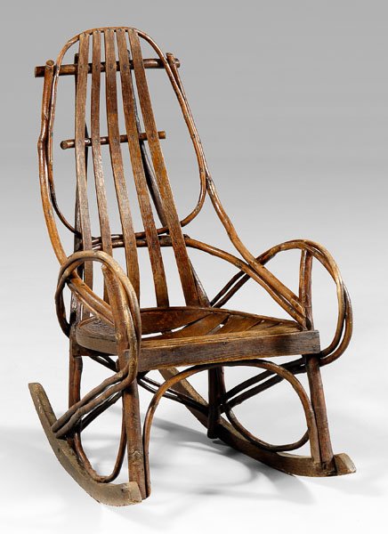 Rustic bentwood rocking chair,: hickory, oak and other mixed woods, old patinated surface, 20th century, 39-1/2 x 21-3/4 x 20 in. Minor repairs at joints of rockers to legs, some later nails, other normal wear, minor losses.