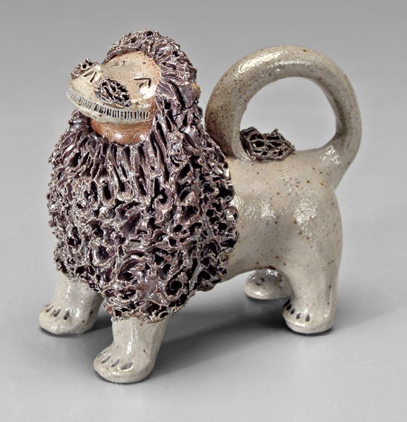 Folk art pottery lion,: marked on base "Owens BH", possibly Vernon Owens and Billy Ray Hussey, height 4-3/8 in. Excellent condition. Provenance: Private Collection.