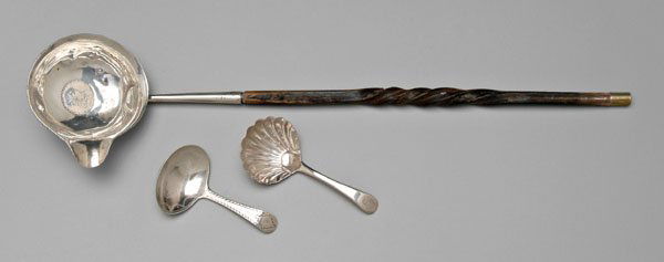 Three pieces English silver: tea caddy spoon, shell bowl, marks for William Eley & William Fearn, lacking city mark, 1797, later "S" monogram, 3-3/8 in., [handle bent;] tea caddy spoon, oval bowl, marks for George Burrows, lackin
