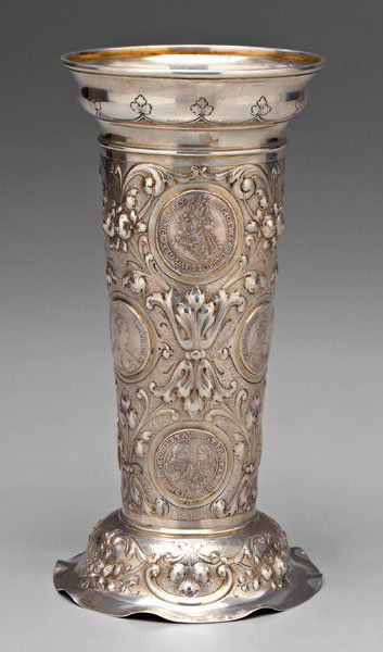 German silver coin vase,: flared rims, acanthus, scroll and floral decoration, inset coins, gilt, marks for Germany, late 19th century, no monogram, .800 fine, 25.81 oz.T., 11-1/4 x 5-1/2 in. Loss to gilt, wear, light scratche