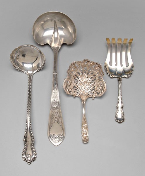 Four pieces sterling silver: Gorham Raphael ladle, 13 in.; Dominick & Haff Mazarin ladle, 11-1/4 in.; Whiting large bonbon, daffodil openwork design, 8 in., [possibly recast, two cracks in handle;] Whiting Louis XV asparagus serv