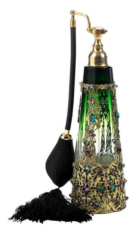E & JB Empire Filigree and Jeweled Atomizer: Czech, circa 1930s, green glass bottle with gilt filigree mounted with green and amethyst jewels, brass hardware and etched on base, "E & JB/Czechoslovakia", 10-1/4 in. - Provenance: Collection of San