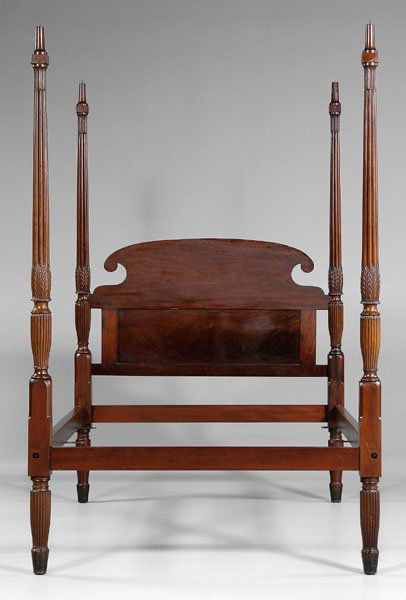 Federal bed,: mahogany with reeded and tapered posts with lamb's tongue chamfers, carved leaves at central section, headboard with hand-planed and chamfered panel, turned feet, 19th century, 89 x 57 x 82-1/4 in., i
