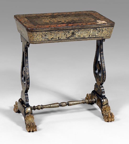 Chinese export work or sewing table,: hinged top opening to fitted interior on lyre supports with carved paw feet, lacquered overall, two lidded compartments; lids for two additional compartments, bone compartments covers and other elemen