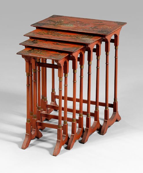 Nest of four red japanned side tables: