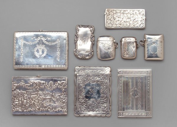 Nine silver cases:: four English silver card cases, Birmingham, 1889 to 1909, 1-1/2 in. to 4-1/4 in.; three English silver vestas (match safes), Birmingham, 1902 to 1911, 1-1/4 in. to 2 in.; one sterling vesta, 2-1/2 in.