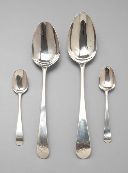 Hester Bateman silver flatware,: downturned oval handles, all with marks for Hester Bateman, London, monograms: serving spoon, 1787, 8-5/8 in., [bowl possibly repaired;] serving spoon, 1784, 8-1/4 in., [tears in bowl;] two spoons, 17