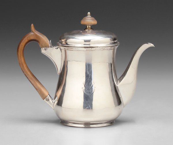 Matthew Boulton argyle,: pear-form, Old Sheffield plate, double-wall body with hinged filler flap at handle, wooden handle and finial, let-in shield with heraldic device, marks for Matthew Boulton, Sheffield, early 19th centu