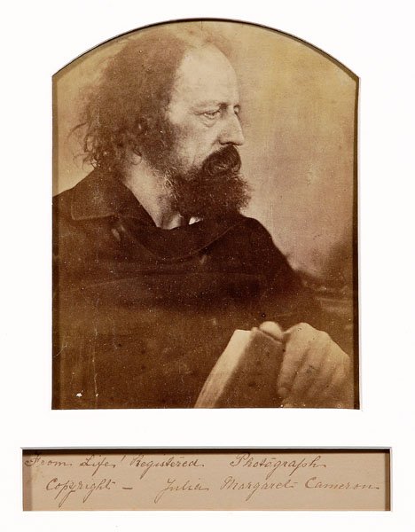 Alfred Lord Tennyson photograph,: "The Dirty Monk", by Julia Margaret Cameron (British, 1815-1879), albumen print, tombstone-shaped format, 9 x 7-1/4 in.; separate sheet attached to mount, signed in ink "From Life Registered Photograp