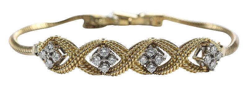 Diamond Bracelet: 16 round brilliant diamonds estimated total weight 0.96ct., twisted rope links in center stamped "Jabel, 18kt.", yellow and white gold, chain on both sides stamped "KestenMade, 1/20 10K GF USA", gold 