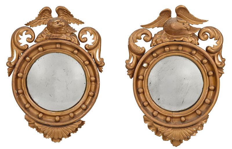 Pair Classical Style Eagle Convex Mirrors: American, late 19th/early 20th century, typical form with spread wing eagle finial, composition ornaments, 22 x 15 in. Provenance: Estate of T. Kenneth and Karin Ellis, "Stepping Stones", Hot Springs,