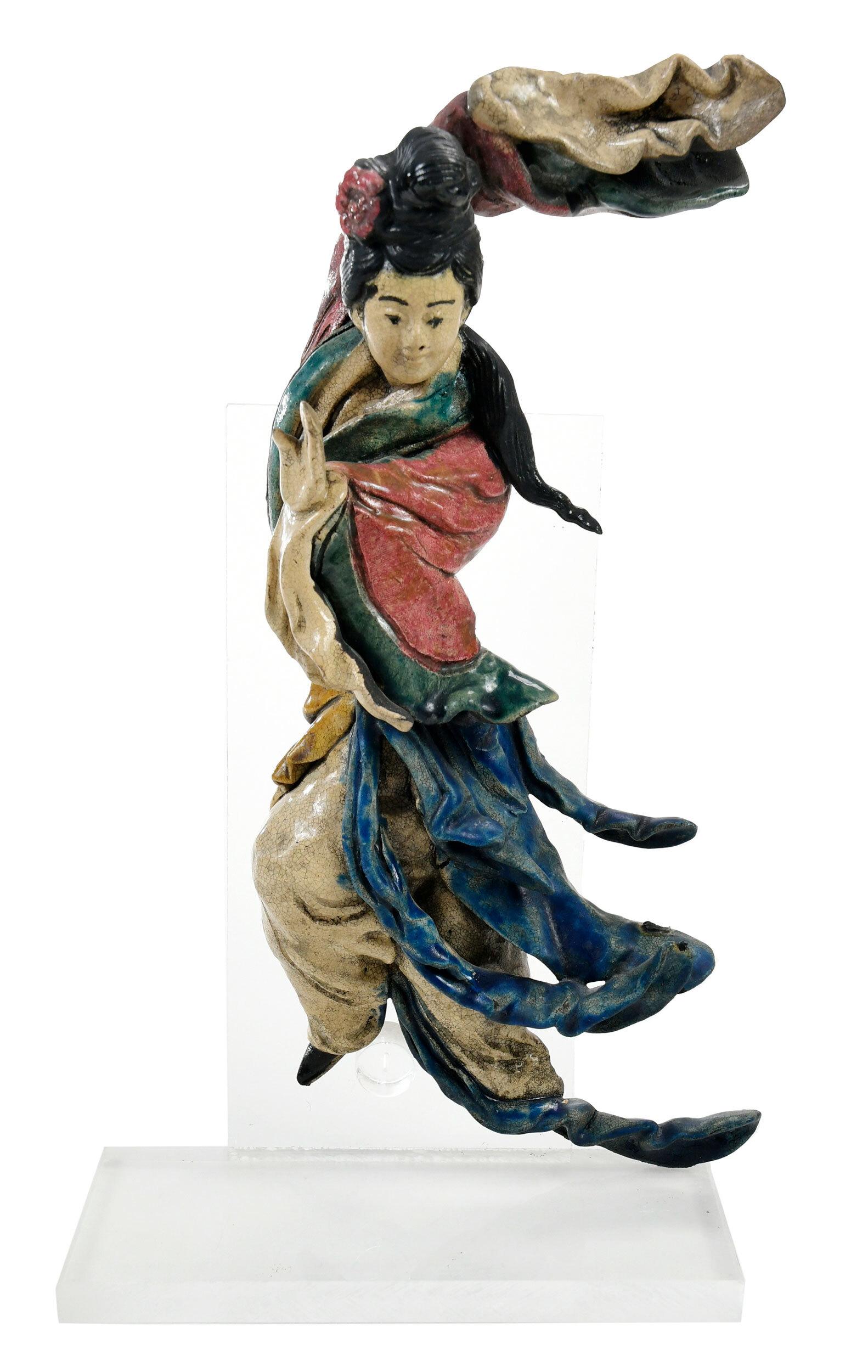 Ornate Chinese Ceramic Ledge Tile: late Qing dynasty, Guanyin in polychrome glaze, affixed to clear lucite stand, 12 in.ÿ Provenance: James Kennedy Antiques, Ltd., Durham, North Carolina, May 1986 for $500 (accompanied by copy of rece