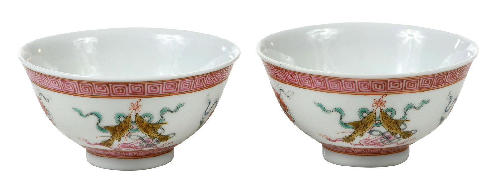 Pair of Republic Famille Rose Porcelain Tea Bowls: each with iron red Hongxian Yu Zhi mark to base, finely enamel decorated withÿthe eight auspicious Buddhist symbols between rose Greek fret borders, gilt accents, 1-3/4 x 3-5/8 in. Note: An identical