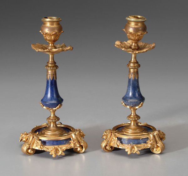Pair Rohloff candlesticks:: lapis lazuli with finely cast bronze dore mounts with vines and flowers, each with three scrolled feet and central shaft with urns below single candle socket, bases marked "O. Rohloff/Berlin" (Otto Ro
