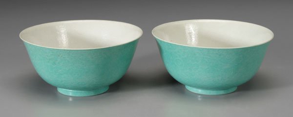 Pair Chinese turquoise-glazed bowls:: incised dragons with pearls over waves, white interiors, bases with blue six-character (Guangxu mark (1875-1908), possibly of the period, 3 x 6-3/8 in. Both with 2-1/2 in. rim crack, stack wear, flaws