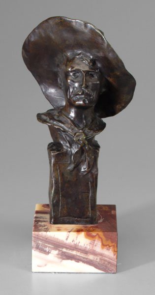 Bronze after Remington,: portrait bust of a cowboy, signed "Frederic Remington" and "Copyright by Frederic Remington", after Frederic Sackrider Remington, New York, 1861-1909, patinated bronze, 12 in. with agate base. Dark br