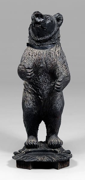 Black Forest style umbrella stand,: standing bear with basin, short chain between front paws, molded plastic, modern, 34-1/2 in. Minor chips and losses. Provenance: Private Collection, Highlands, North Carolina.
