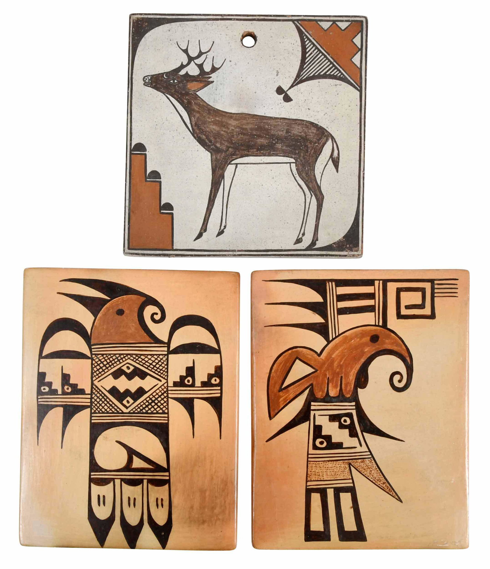 Signed Sadie Adams Hopi Tiles: 20th century, two by Sadie Adams (Hopi/Tewa, 1905-1995), both signed verso with the potter's peach blossom symbol, both decorated with stylized bird symbols, 7 x 5-1/2 in.; together with a Zia tile si