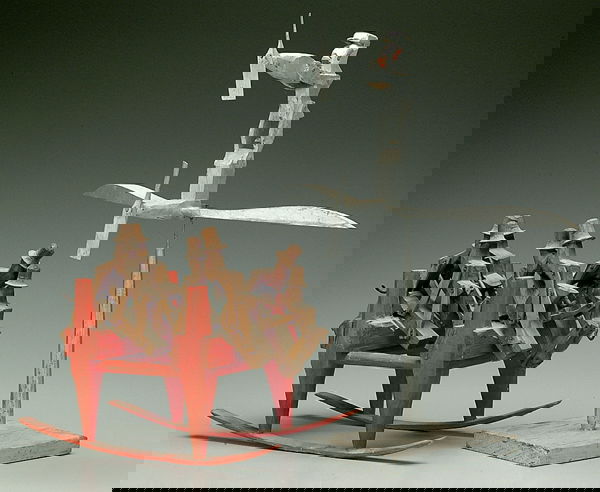 Two contemporary folk art toys: whirligig with monkey and propeller mounted on wings and propeller, swivels, silver paint with some surface losses, 18-1/2 x 17 x 17; four pairs monkeys on rocking stool, red-painted rocker, some glue