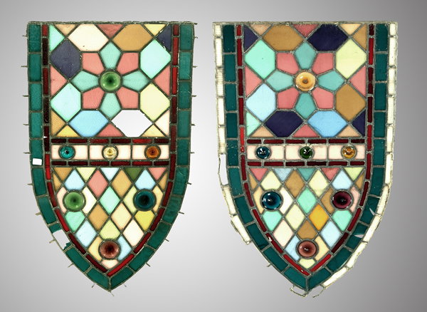 Two arched stained glass panels,