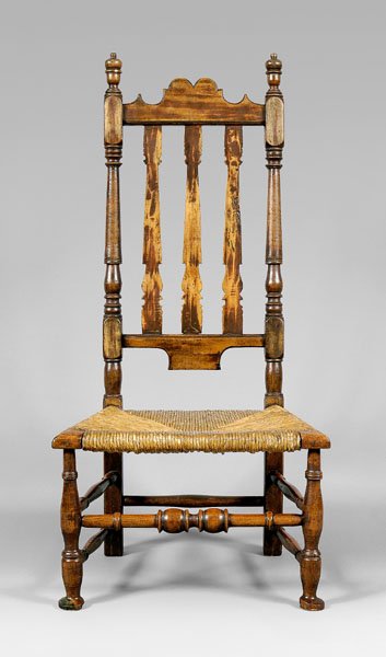 New England William and Mary chair,: banister-back slipper chair with rush seat, turned stretchers and pad feet, traces of original reddish-brown paint, 18th century, 38-3/4 x 19-1/2 x 14-1/4 in. One toe patched, other scattered pest dam