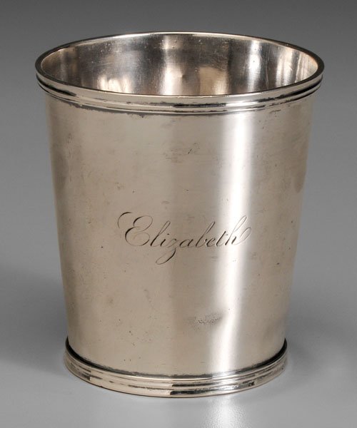 Mitchell coin silver julep cup,: tapering sides, reeded rim, partial marks for William Mitchell, Jr. (Richmond, Virginia, working 1818-1845), inscribed "Elizabeth", 3.74 oz.T., 3-1/4 x 3 in. Several dents, light scratches.