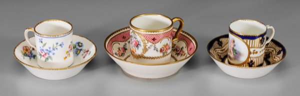 Three Sevres cups and saucers:: cup, floral bouquets on white ground, blue Sevres mark encircling "CC", 2-3/8, matching cup plate with same mark, 4-7/8 in., [small chip at base, minor surface abrasions;] cup, floral reserves with pi