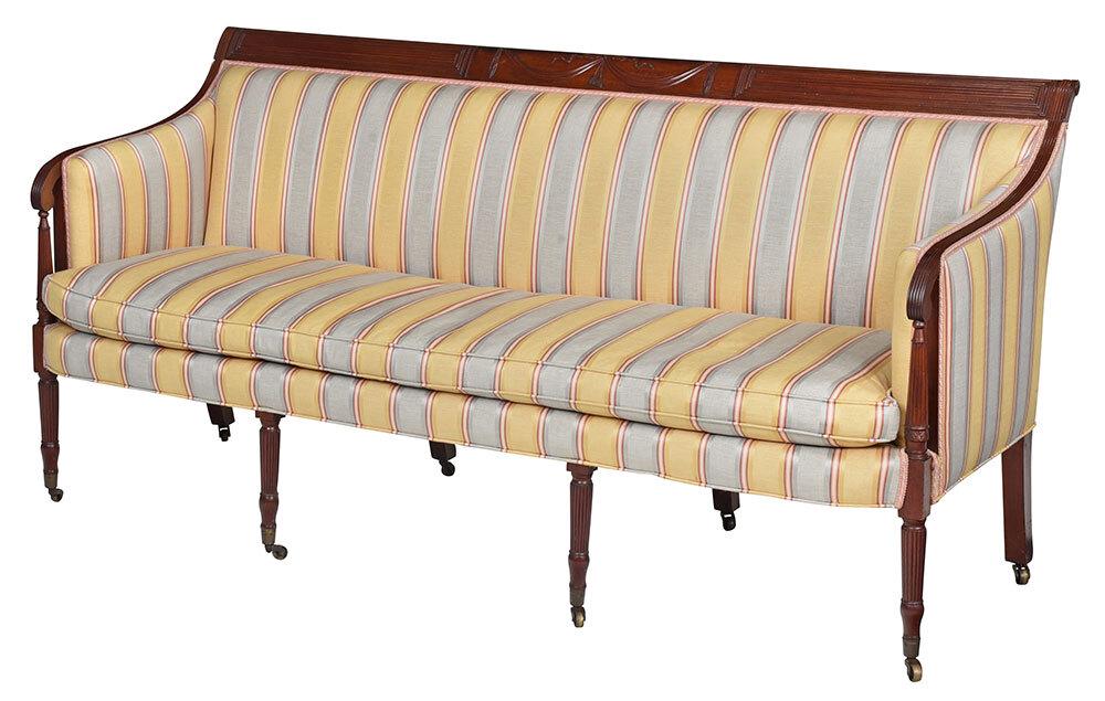 Fine New York Federal Carved Mahogany Sofa: attributed to Duncan Phyfe or one of his contemporaries, circa 1810, reeded crest centering panel of fine carving with drapery swags and tassels, reeded arms and turned arm supports, turned legs with