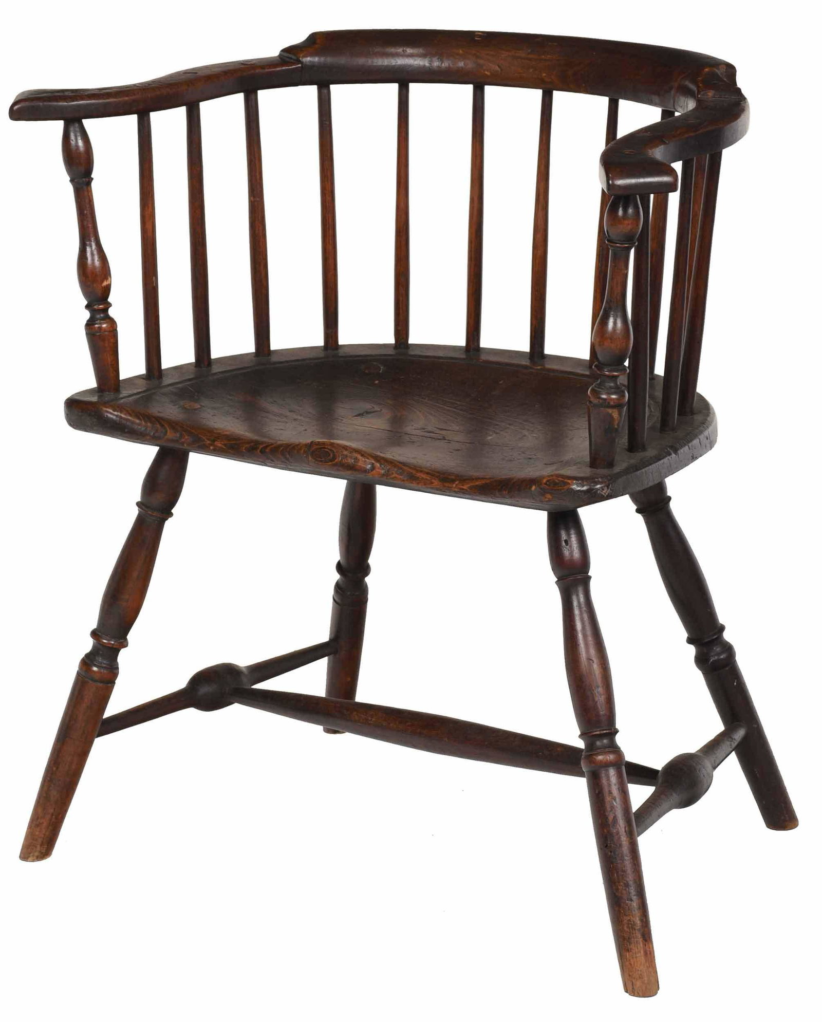 Philadelphia Chippendale Windsor Armchair: Pennsylvania, late 18th century, yoke form with spindle back and shaped arms, deeply shaped seat, turned legs and stretchers, deeply shaped poplar plank seat, on turned walnut legs and stretchers, 30-