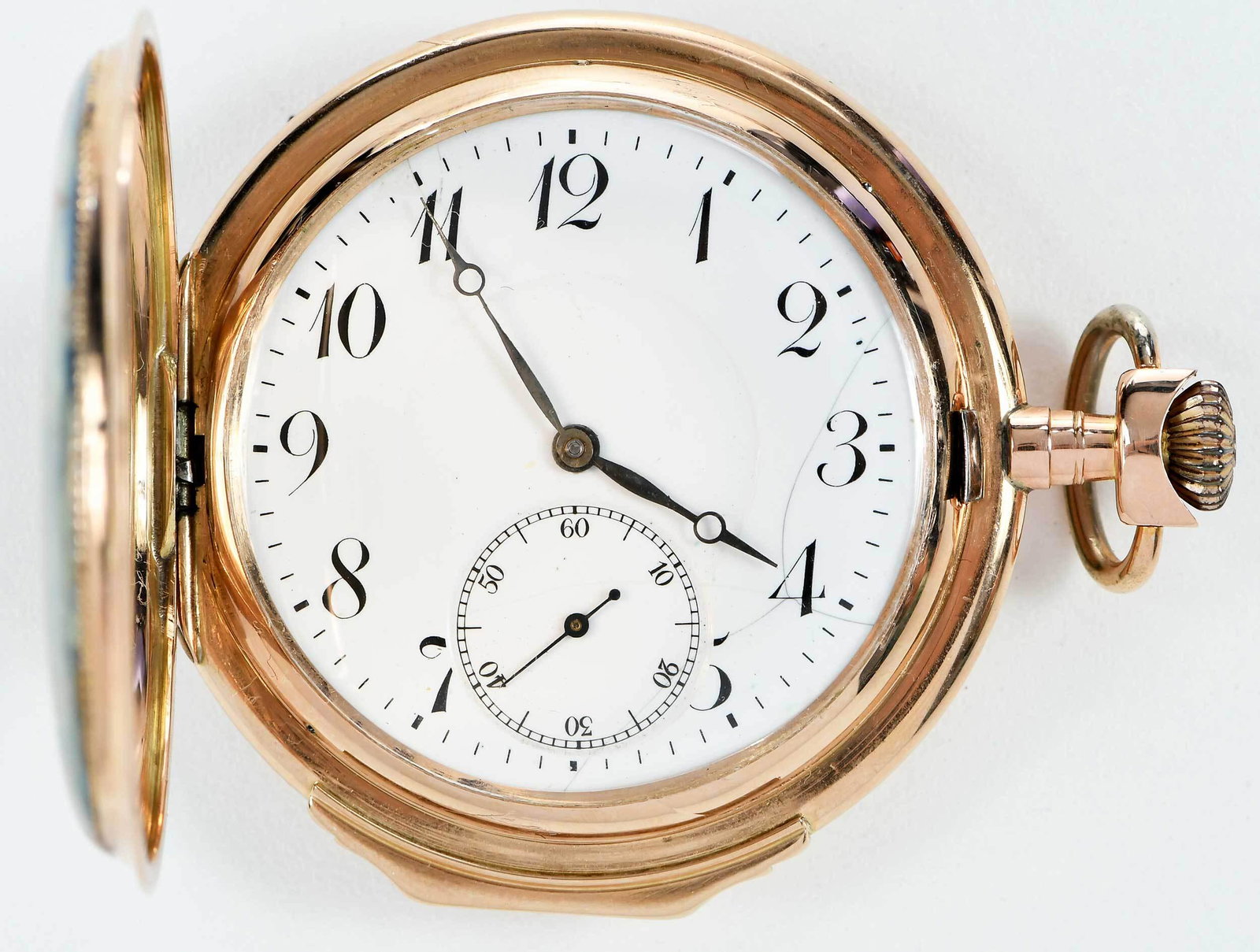 14kt. Pocket Watch: 55mm painted hunter case, inside case stamped "0,585, 941, 68941" and with maker's marks and Swiss squirrel hallmark, 106 grams ÿ Provenance: A Virginia Collector