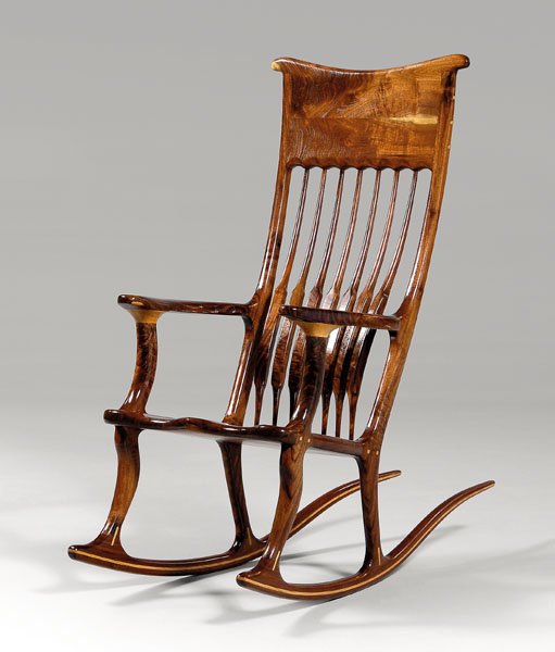 Hand-crafted rocking chair,: figured walnut, large scale, finely constructed, figural walnut throughout with oak arm supports and inlaid decoration, bottom inscribed "Curtis Whatley" and "1", 52 x 26-1/2 x 51-1/2 in. Excellent co