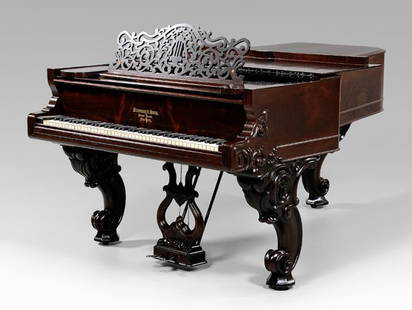 1873 rosewood Steinway piano,: serial number 25070, scroll legs with applied carved ornament, pierced music stand, fine mellow tone, 38-1/2 x 54 x 87 in. Excellent condition, minor scuffs and surface abrasions, completely reconditi