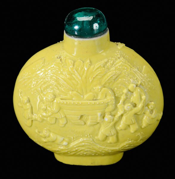 Chinese porcelain snuff bottle,: molded, yellow-glazed, one side with Sima Guang breaking a vat to save a drowning boy, verso with boys playing, base with molded Chenghua mark (1465-1487), green glass stopper, 19th century, 2-1/4 in.