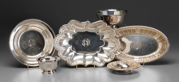 Six pieces sterling hollowware:: two Revere style bowls; Kirk nut dish; Kirk bowl; oval bread tray; oval scalloped tray, most with monograms, 53.07 oz.T.; detailed list available.