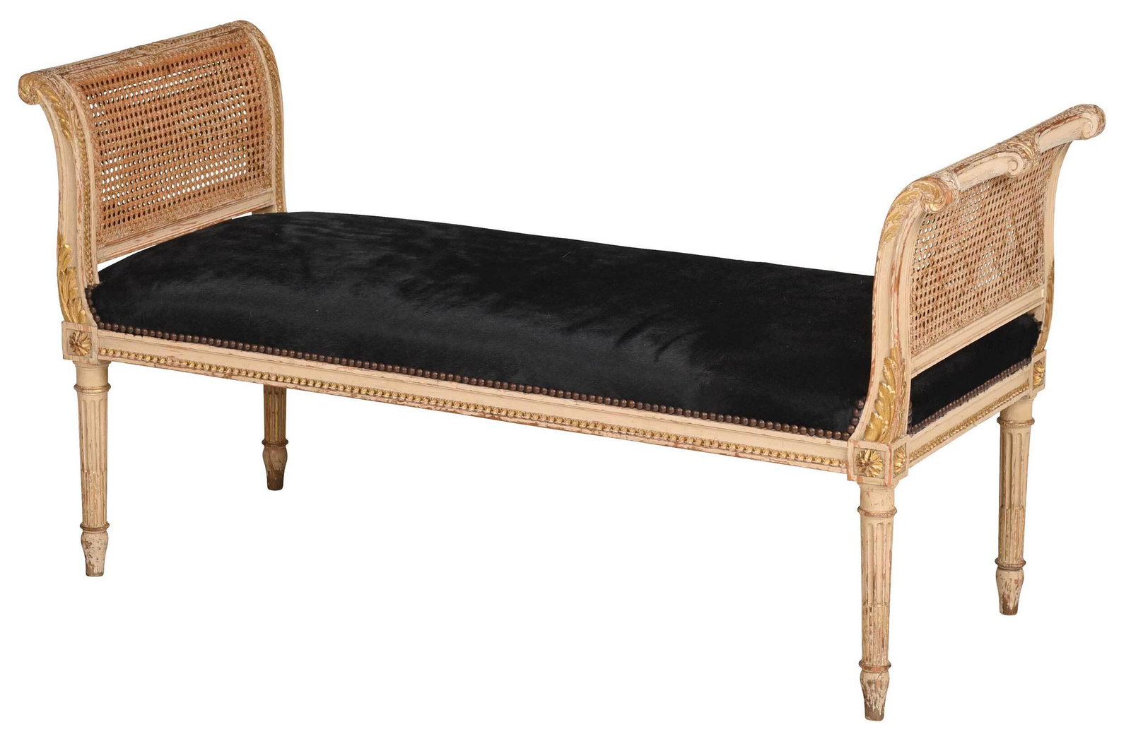 Louis XVI Style Painted Parcel Gilt Window Bench: Continental, late 19th/early 20th century, well carved frame with scrolled and leaf carved arms, double caning panels, stop fluted legs, black animal hide upholstery with brass tacking, 25 x 48 x 18-1