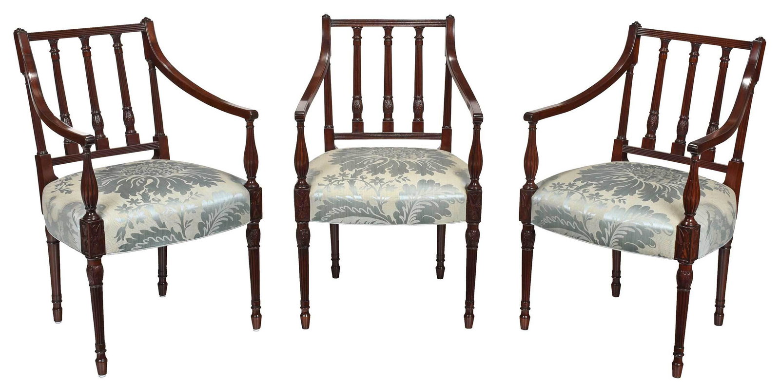 Set of Three Federal Carved Mahogany Armchairs: British or American, possibly Ephraim Haines of Philadelphia (1775-1837), circa 1810, each with reeded crest over three reeded and carved columns, carved and reeded legs, fine silk damask upholstery, 