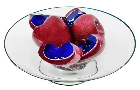 Marc Petrovic: (American, born 1967) In the Beginning, 1992, signed "Marc Petrovic '92" on base of tazza, blown glass with hot sculpted applied glass, assemblage of sliced and whole apples on a glass tazza with snak