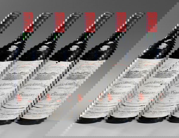 Five Bottles Red Bordeaux Wine: Chateau Grand Puy-Lacoste, Grand Cru Class?, 1986, minimal ullage, labels with scattered stains and small losses, otherwise excellent condition, properly cellared Provenance: Private Collection, Hende