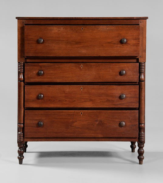 Walnut Chest of Drawers: Greene County, Tennessee, 19th century, walnut with poplar secondary, four dovetailed drawers, split-spindle turned front columns, turned legs, frame-and-panel back with large poplar boards, 46 x 41-1
